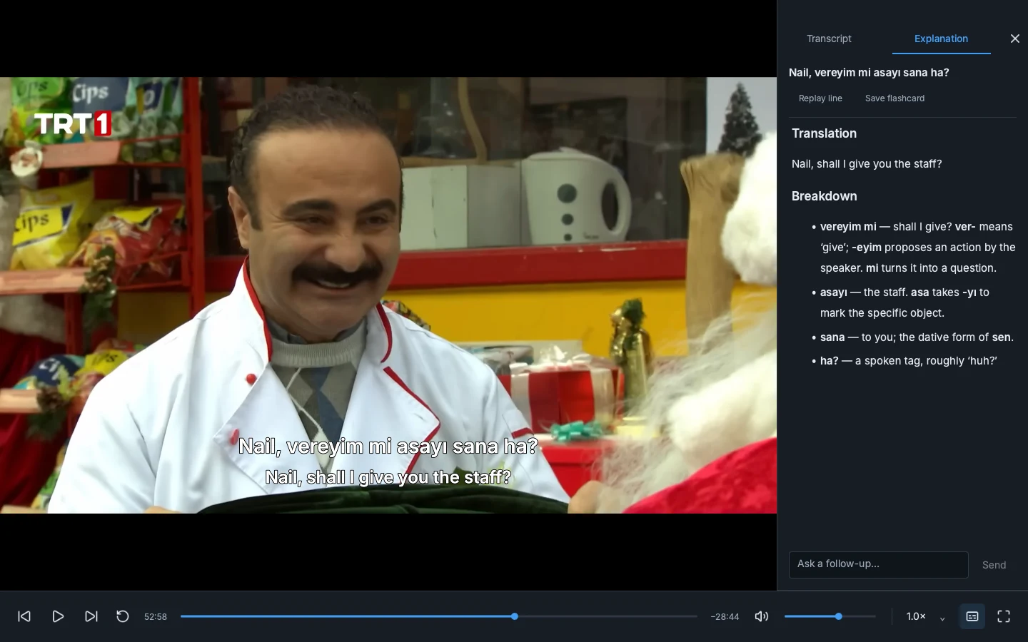 Neden’s explanation sidebar translates a subtitle line and breaks down its words, with a follow-up input below.
